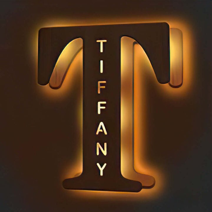 Illuminated wooden alphabet letter lamp "T" for Tiffany, customizable night light for nurseries and bedrooms.